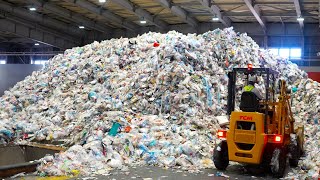 Japanese Plastic recycling process. A recycling factory produces 450,000 recycled pallets per year.